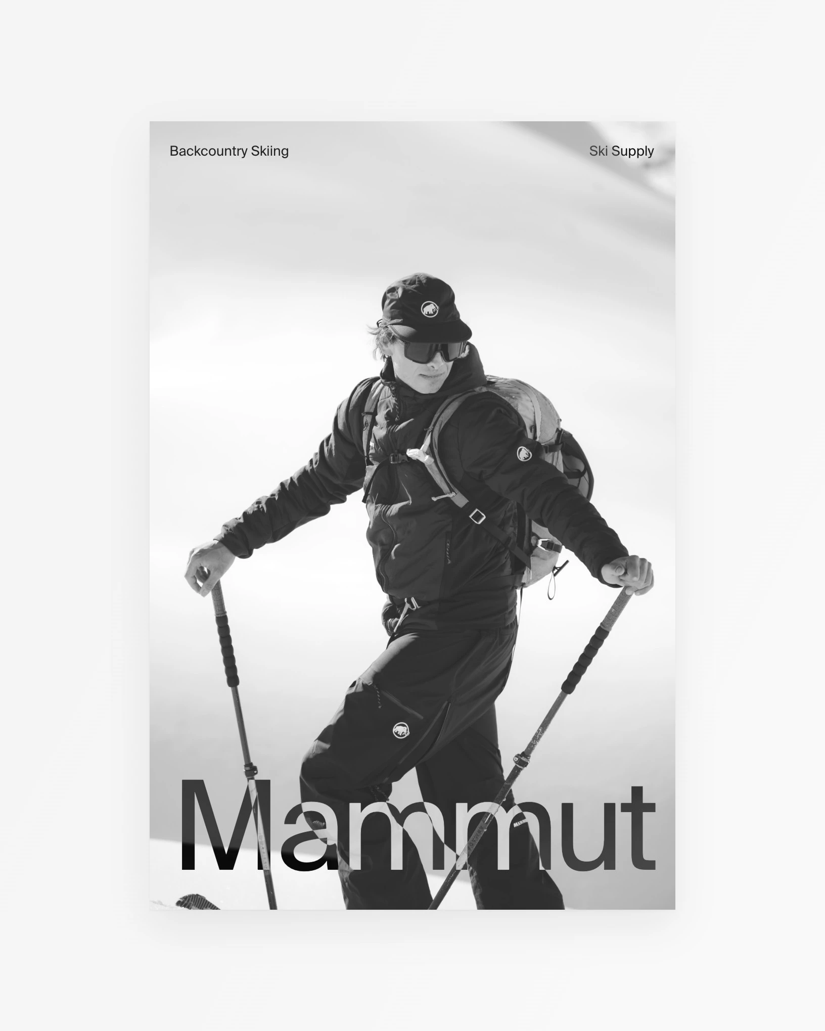 Black-and-white Ski Supply pin of a Mammut skier